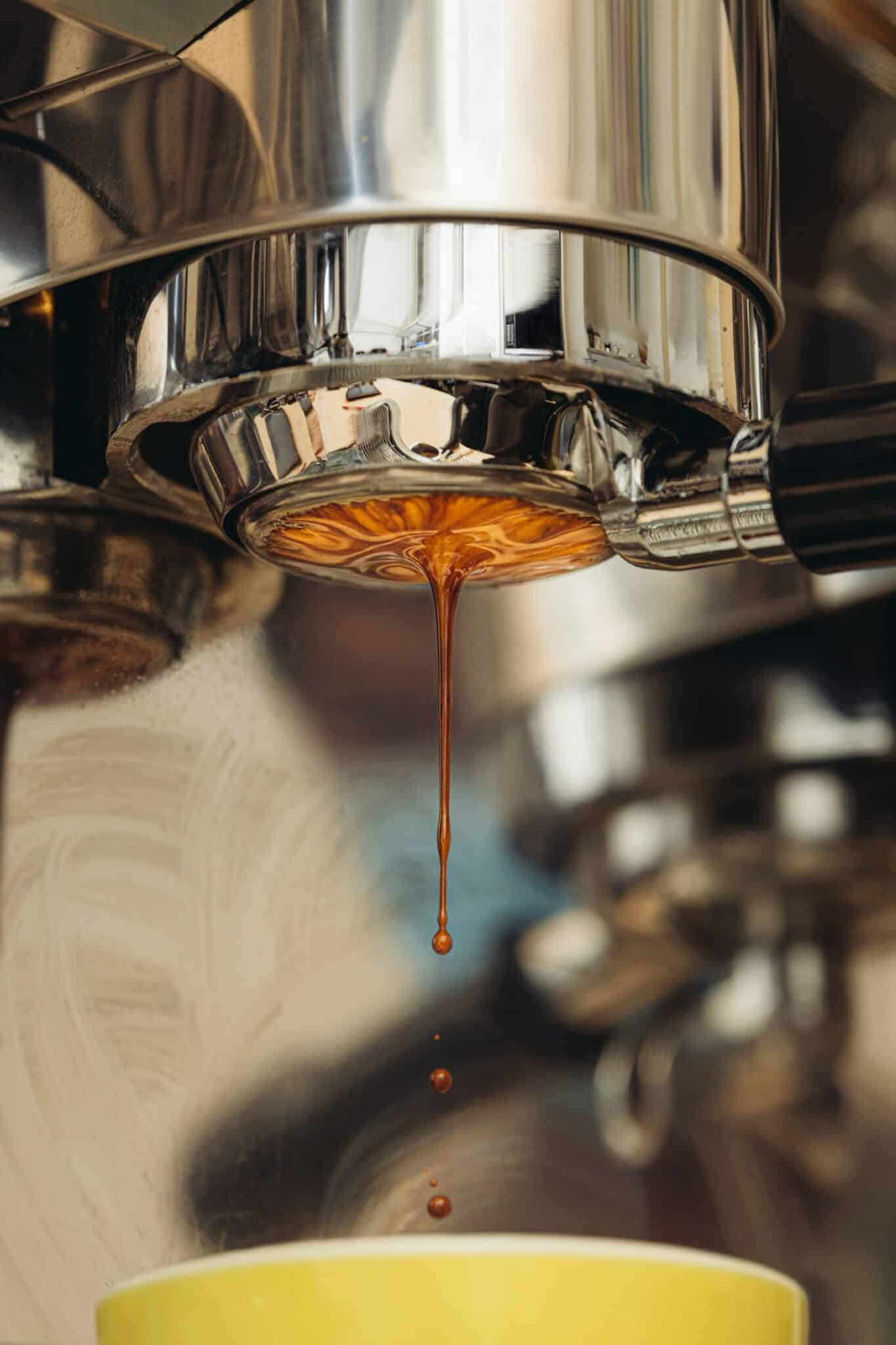 Hot water being poured for brewing coffee at the ideal temperature of 195 to 205 degrees Fahrenheit